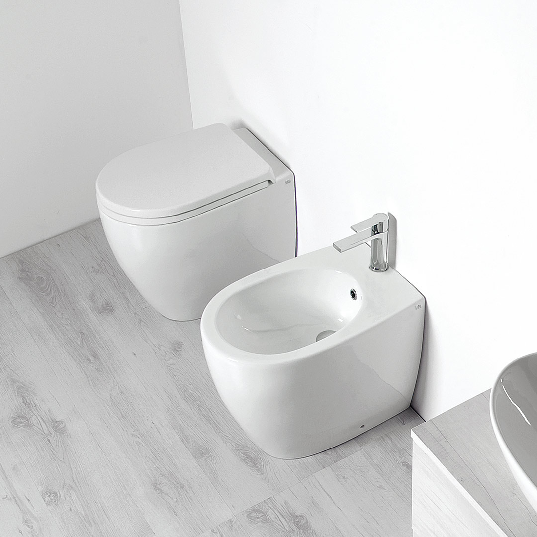 Linea Zeta coppia sanitari vaso rimless e bidet a pavimento filo parete con  sedile rallentato bianco